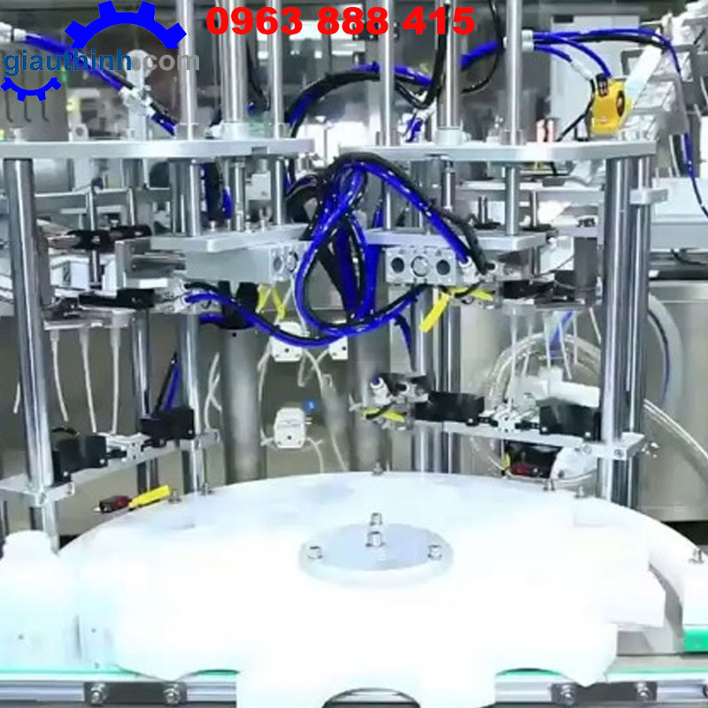 Máy siết nắp chai