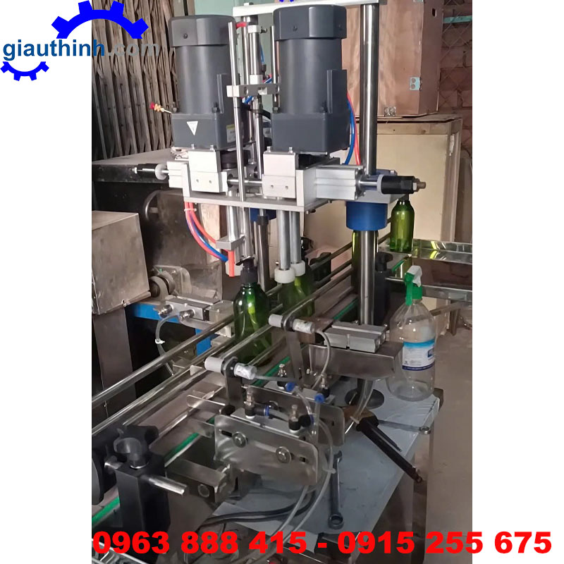 Máy siết nắp chai
