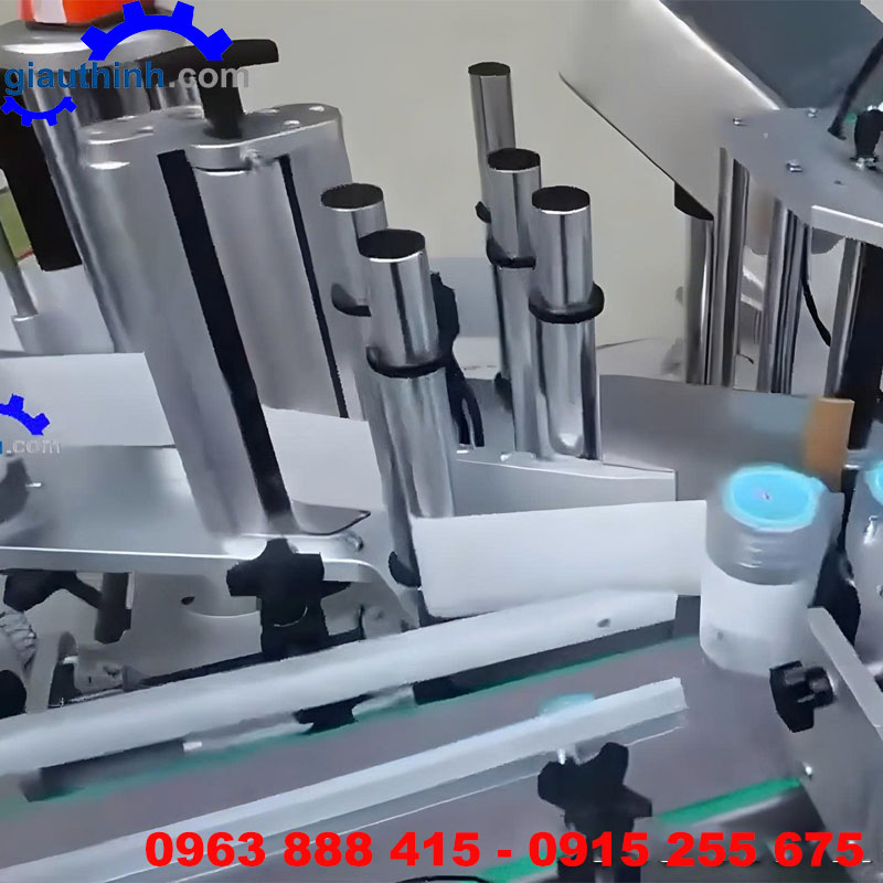Máy dán nhãn chai dẹp